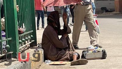 أثر ارتفاع درجات الحرارة على المواطنين بشوارع القاهرة والجيزة | صور