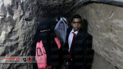 بالصور.. شاب فلسطينى يتزوج مصرية داخل أحد أنفاق رفح