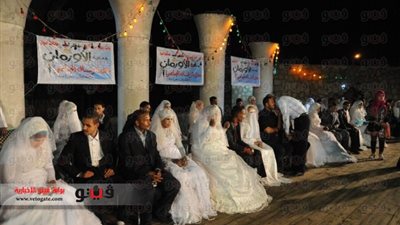 بالفيديو والصور.. حفل زفاف جماعى بأسوان