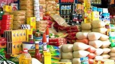 ضبط مخزن لتعبئة المواد الغذائية بدون ترخيص فى الوراق