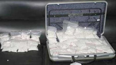 إحباط محاولة تهريب 100 جرام هيروين ونظارة تجسس بمطار القاهرة