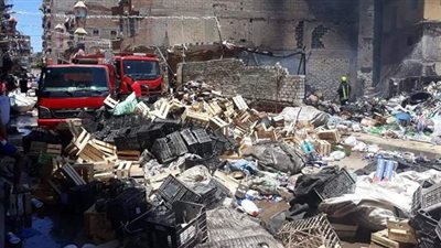 إخماد حريق بأرض فضاء في الإسكندرية | صور