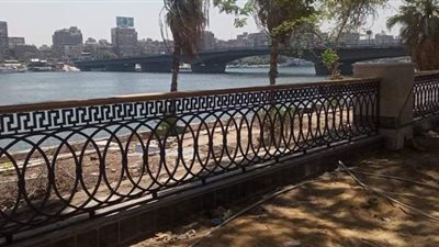 الجيزة تواصل رفع كفاءة شارع النيل السياحي | صور