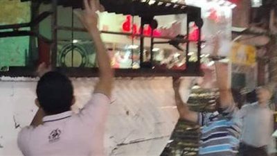 رفع 50 إشغالا وتشميع محل عصير بشارع المحطة في الجيزة | صور