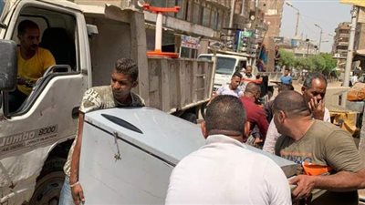 حملة لإزالة معوقات الحركة المرورية في الجيزة | صور