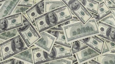 الدولار يسجل 6.97 فى التعاملات المسائية لسوق الصرف