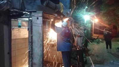 حي جنوب الجيزة ينفذ حملة لإصلاح وإنارة الشوارع | صور