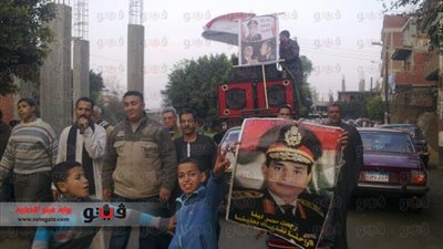 بالصور.. مسيرة بقرية 