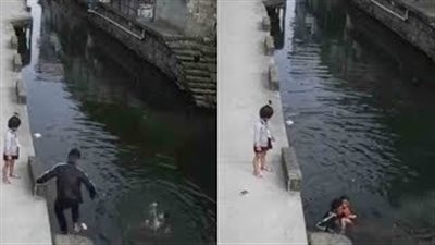 عامل دليفري يقفز في نهر لإنقاذ حياة فتاة (فيديو)