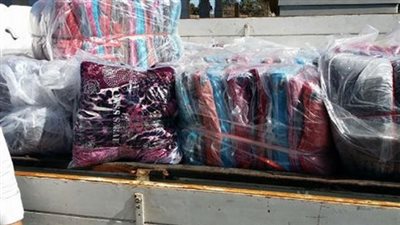 ضبط 18 طنا من الملابس غير خالصة الرسوم ببورسعيد
