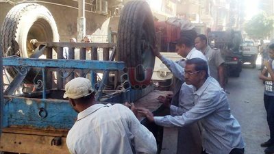 بالصور.. تحرير 425 مخالفة إشغال طريق في سوهاج