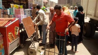 تحرير 90 مخالفة إشغالات بميدان الجيزة | صور