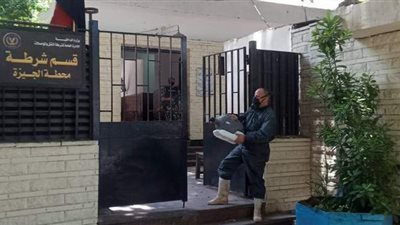 تعقيم محطة قطار الجيزة وقسم الشرطة بحي جنوب الجيزة |صور
