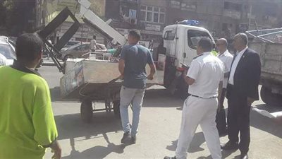 حملات لرفع الإشغالات ومعوقات الحركة المرورية بالدقي