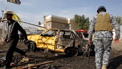 39 قتيلا وجريحا في انفجار سيارتين بالعراق