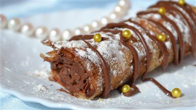 لعشاق الشيكولاتة .. طريقة عمل رولات الكريب بالنوتيلا