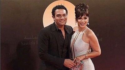 إنجي المقدم برفقة آسر ياسين من افتتاح مهرجان القاهرة السينمائي