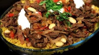 بالبسمتي والخبز المحمص.. طريقة عمل فتة الشاورما الشامية