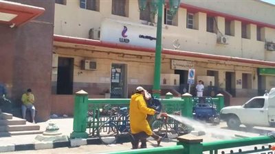 تطهير دور العبادة ومحطات السكة الحديد لمواجهة كورونا بأسيوط | صور