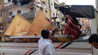 إخلاء سوق التل وضبط سيارتين لإلقاءهما المخلفات بالجيزة