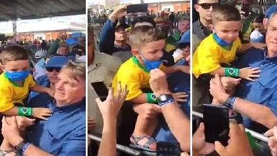 رئيس البرازيل ينزع الكمامة عن وجهي طفلين | فيديو