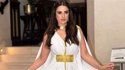 درة تتألق بفستان أبيض في أحدث ظهور | صور