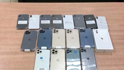 إحباط تهريب سجائر إلكترونية وهواتف بمطار القاهرة