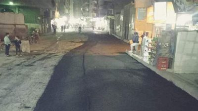 رصف شارع المعهد الديني بحي الوراق | صور