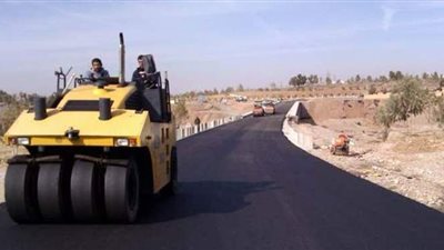 الانتهاء من رصف ترعة الزمر بالعمرانية