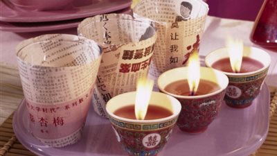 بالصور.. طرق غير تقليدية لتزيين بيتك بالشموع