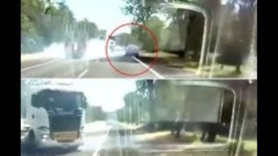 سائق محظوظ ينجو من الدهس أسفل «لوري» (فيديو)