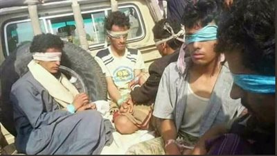 اعتقال وتمزيق شعارات الحوثيين (صور وفيديو)