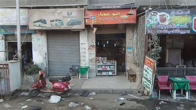 محال الجيزة تتجاهل قرار المحافظ بوضع صناديق قمامة أمامها (صور)