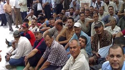 اعتصام العاملين بمرفق النقل بالمحلة للمطالبة بتطبيق الحد الأدنى للأجور