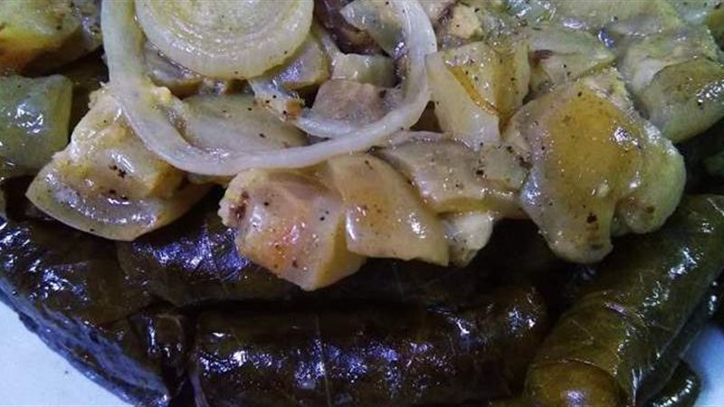 طاجن ورق عنب بالكوارع