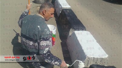 بالفيديو والصور.. حملة لطلاء أرصفة الطرق بشوارع القاهرة