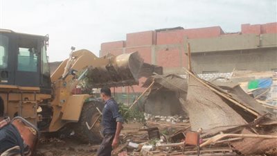 بالصور.. حملات لإزالة التعديات على الطريق الدائري بالفيوم