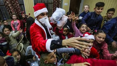 بعد طرد «داعش».. العراقيون يحتفلون بعيد الميلاد (صور)