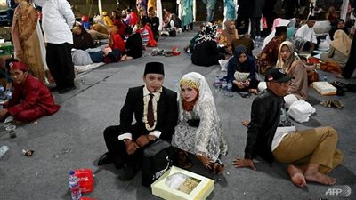 جاكرتا تحتفل بالعام الجديد بعرس جماعي بدلا من الألعاب النارية