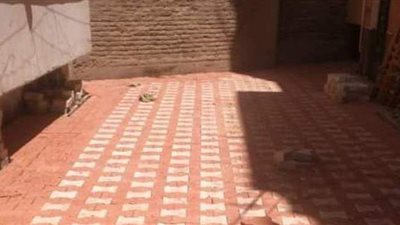 تركيب الإنترلوك في الحواري الضيقة بأسيوط بديلا للرصف في أعمال التطوير|صور