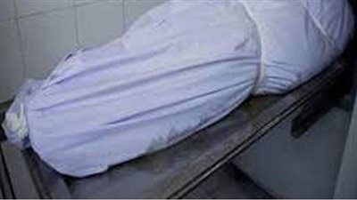 مصابة بطعنتين في الرقبة.. مناظرة النيابة لجثة سيدة ذبحها نجلها في إمبابة