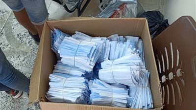 مصادرة 21 ألف كمامة وكحول مجهولين المصدر داخل شركة بالقاهرة