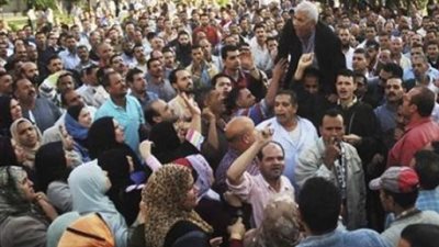 موظفو البريد بكفرالشيخ يعلقون إضرابهم أسبوعًا