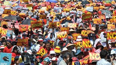 برازيليون يشاركون في مسيرة احتجاج بالعاصمة اليابانية