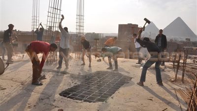 بالصور.. «الجيزة» تزيل عقارين مخالفين في «الهرم»