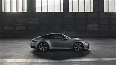 أيقونة 911 كابروليه ذات السقف القماشي القابل للطي (فيديو)