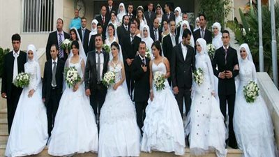 جمعية الإيمان بكفرالشيخ تحتفل بزفاف 22 عروسة