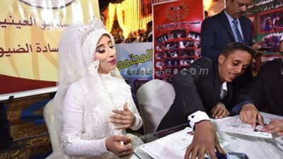 عقد قران 50 عروسا بحديقة الأورمان بحضور محافظ الجيزة | صور