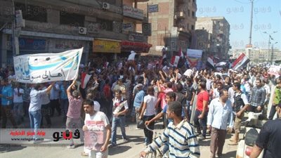 ملتحِ يعتدى على ناشطة عمالية فى مسيرة بالمحلة