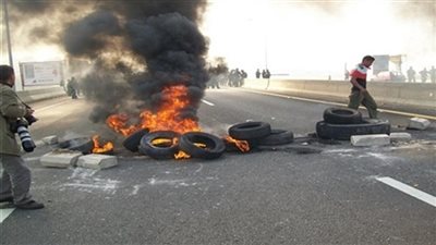 عناصر الإرهابية يشعلون النيران أعلى كوبري شبين الكوم